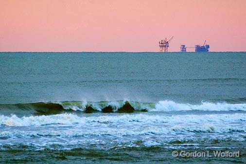 Gulf of Mexico Dawn_55761.jpg - Offshore Eyesores...perhaps necessary, but still ugly.Photographed from Dauphin Island, Alabama, USA.